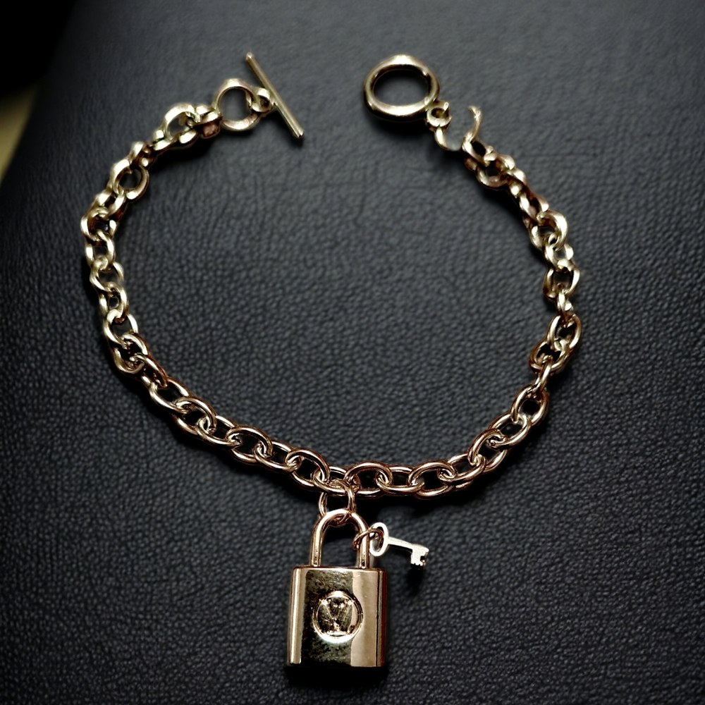 Petite lock- vintage design w/ key on a stainless steel bracelet